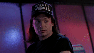 Wayne from Wayne's World making a surprised reaction