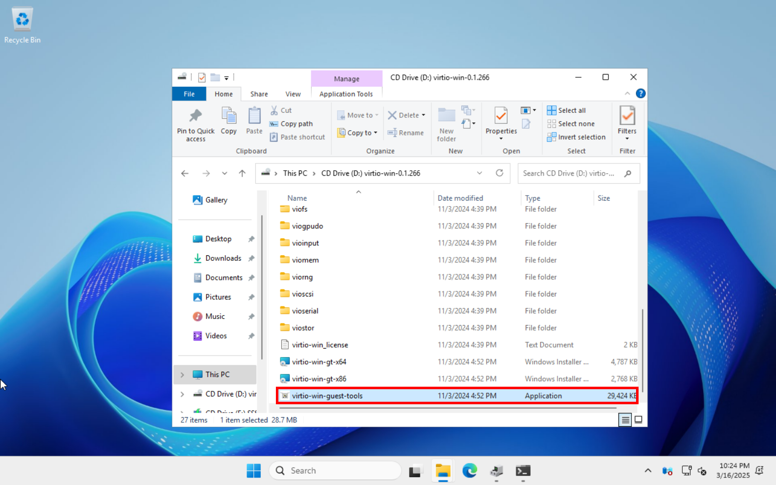 Windows 11 running in a Proxmox VM, displaying the VirtIO driver ISO contents in File Explorer. The 'virtio-win-guest-tools' application is highlighted, indicating the installation of additional drivers and tools for improved VM performance.